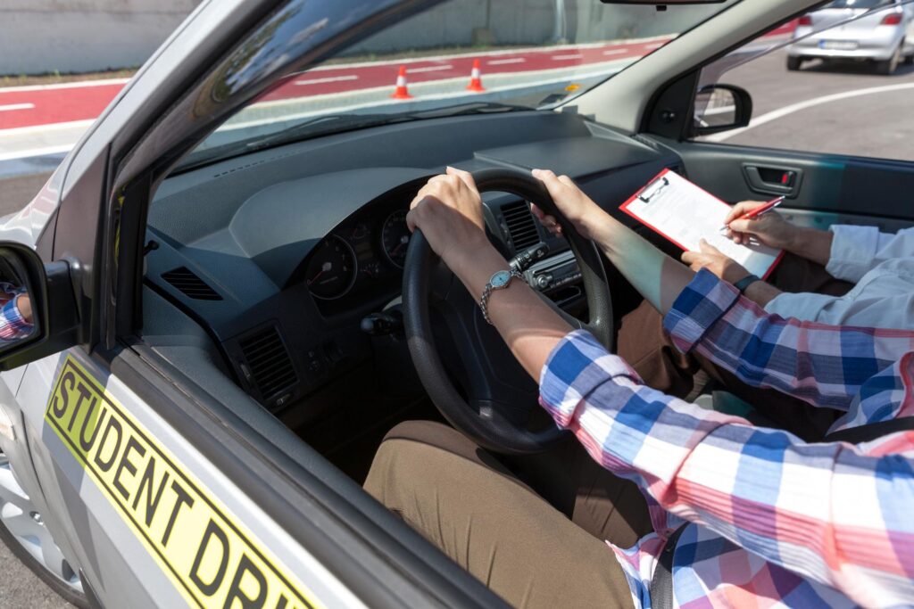 student is on driving lesson