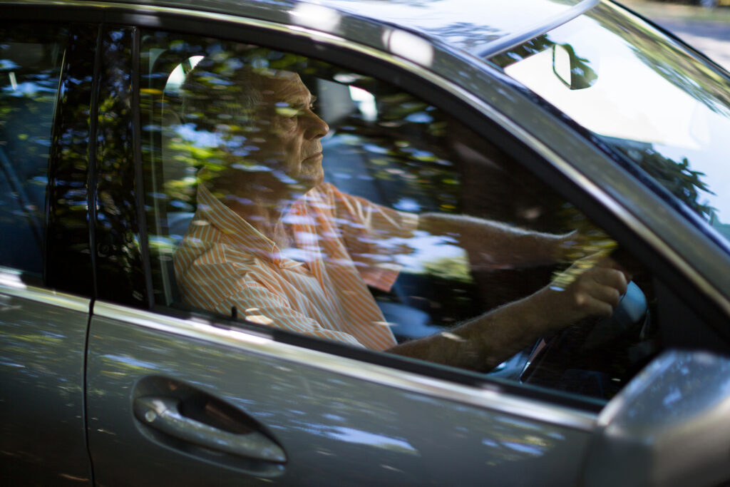 old man driving his car